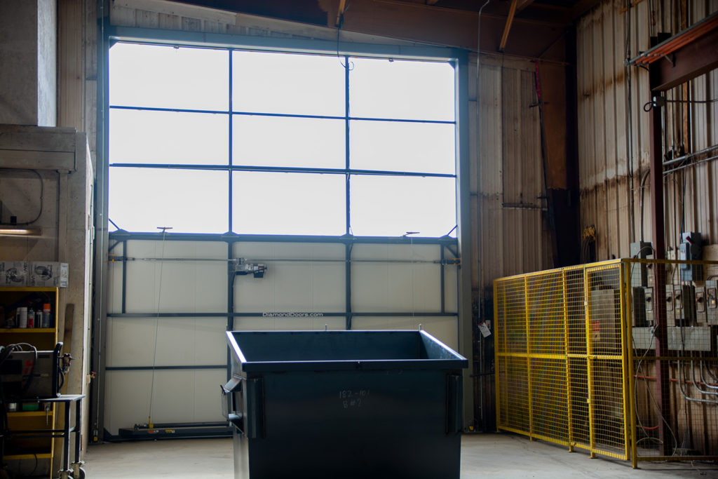 interior bifold door industrial welding shop